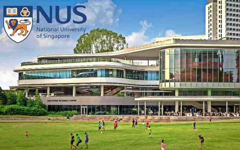 Group of international students smiling at a Singapore university campus