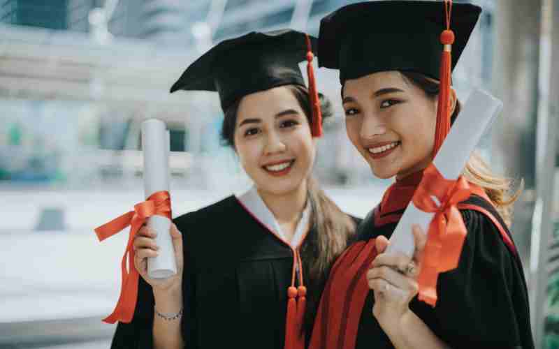 International student studying in a Canadian university library
