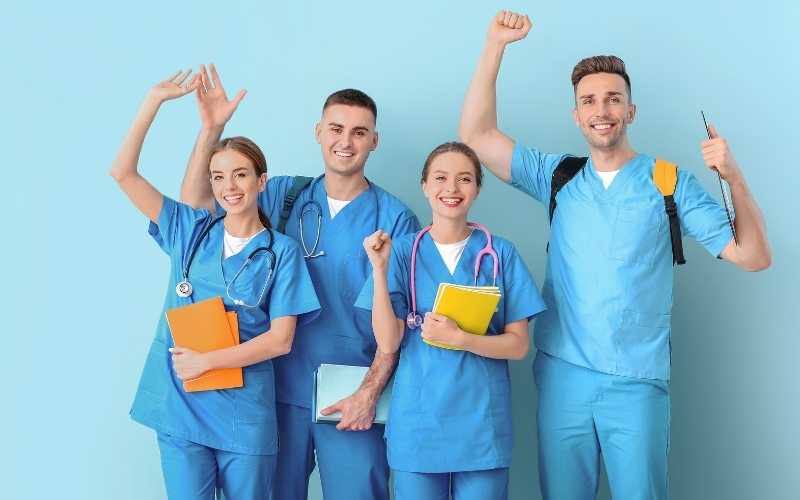 Tutor guiding students through UCAT practice questions during a coaching session