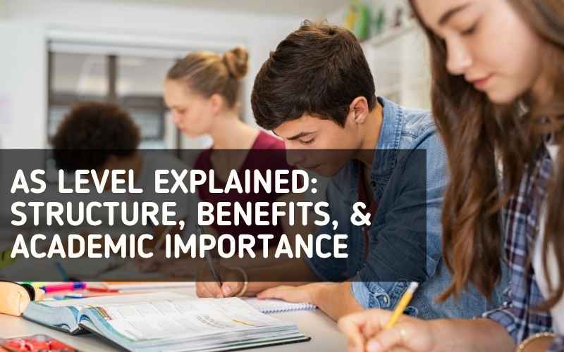 Student studying textbooks and notes for AS Level exam preparation