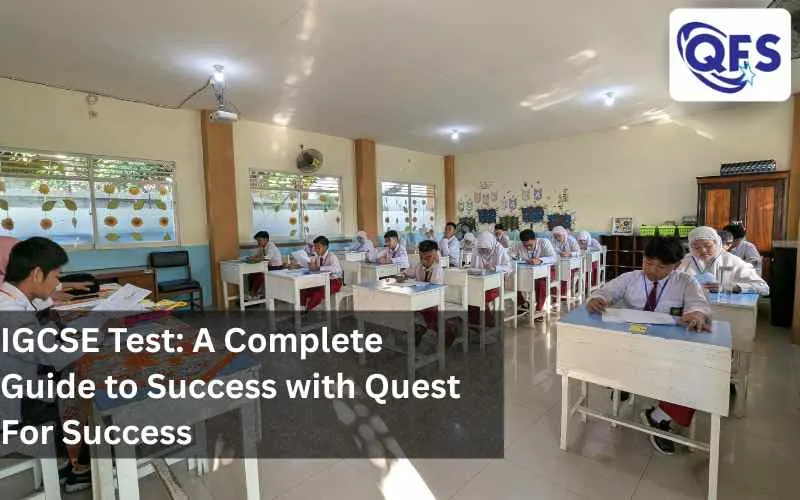 Students writing exam papers at desk to prepare for IGCSE Test