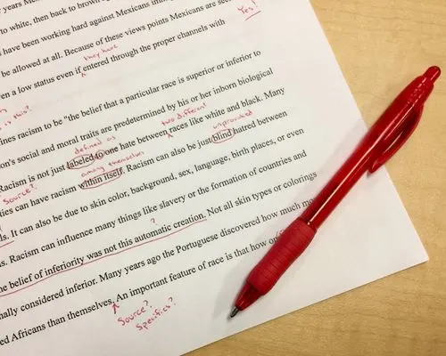 Quest For Success mentor reviewing student’s supplemental essay draft for improvement