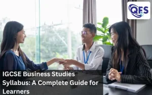 Students studying the IGCSE Business Studies Syllabus with notes & textbooks.