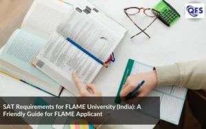 Student preparing for SAT exam on a laptop with notes at a study desk for FLAME applicants